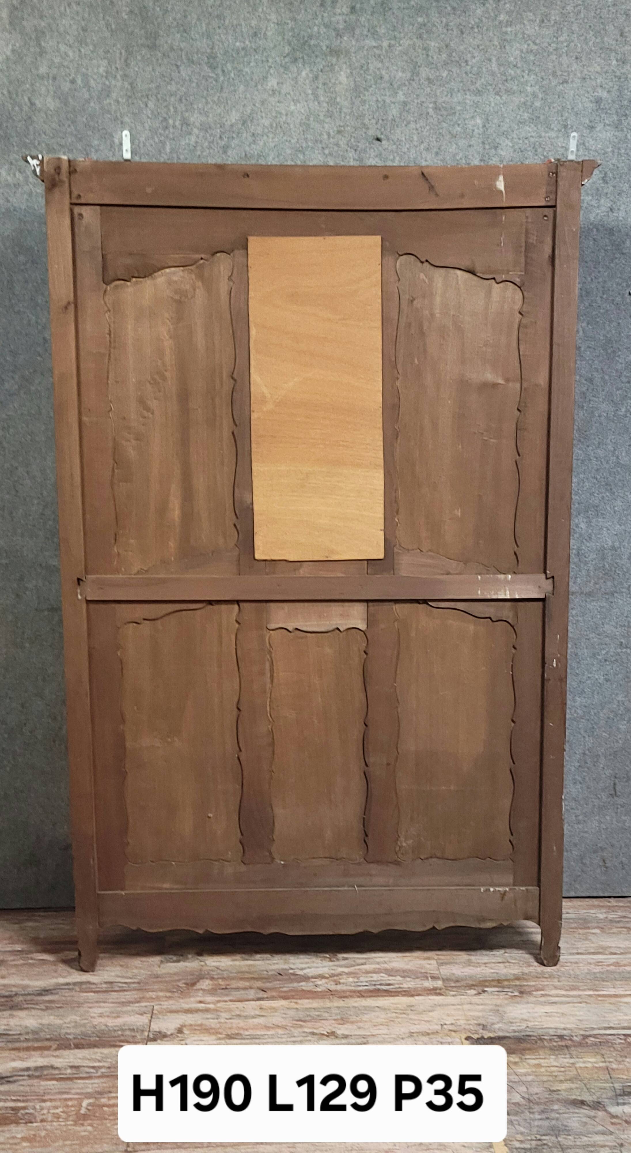 Large coat rack in Louis XV style, made of walnut and elm burl.