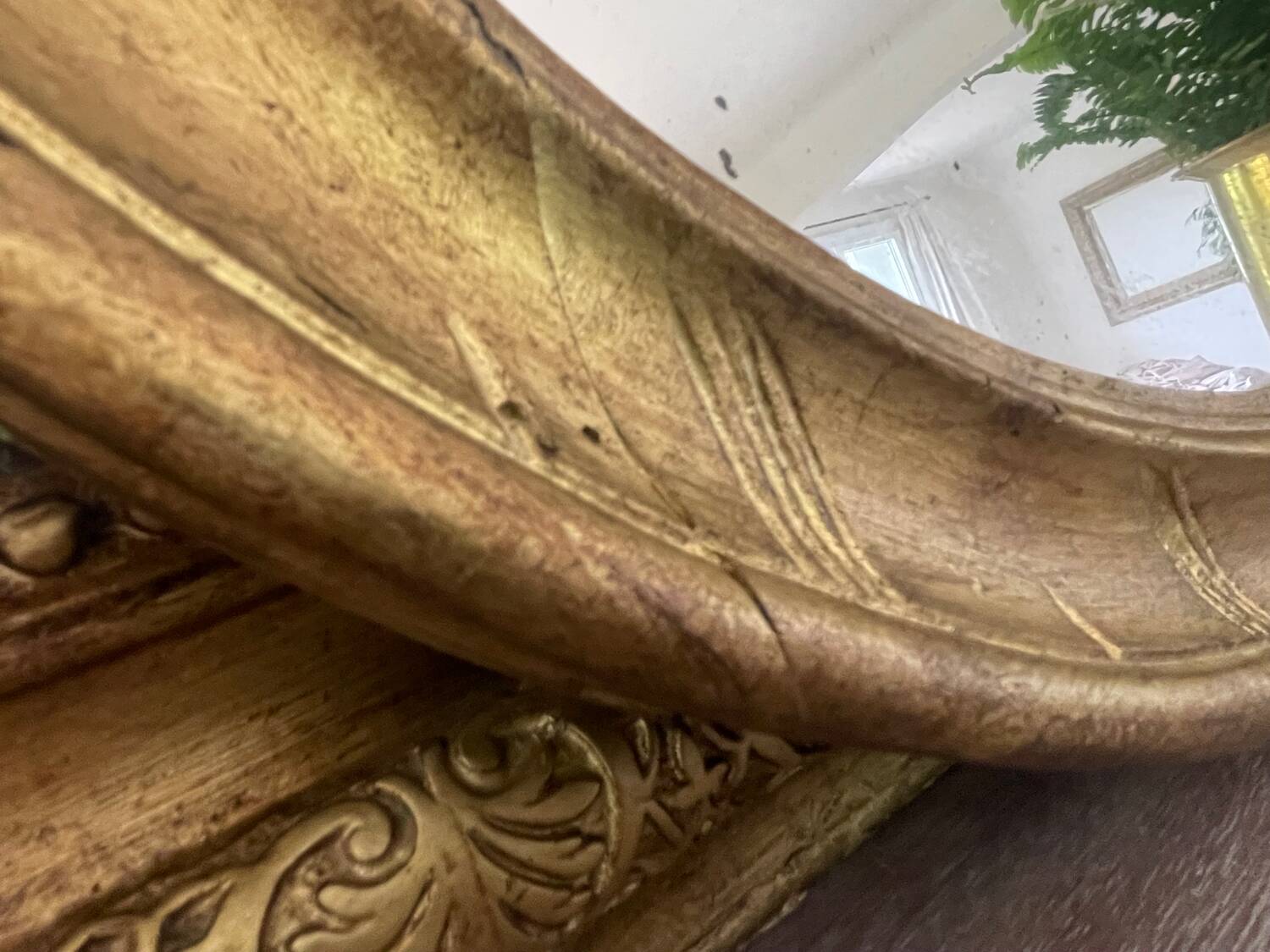 58cm patinated gilded wood mirror