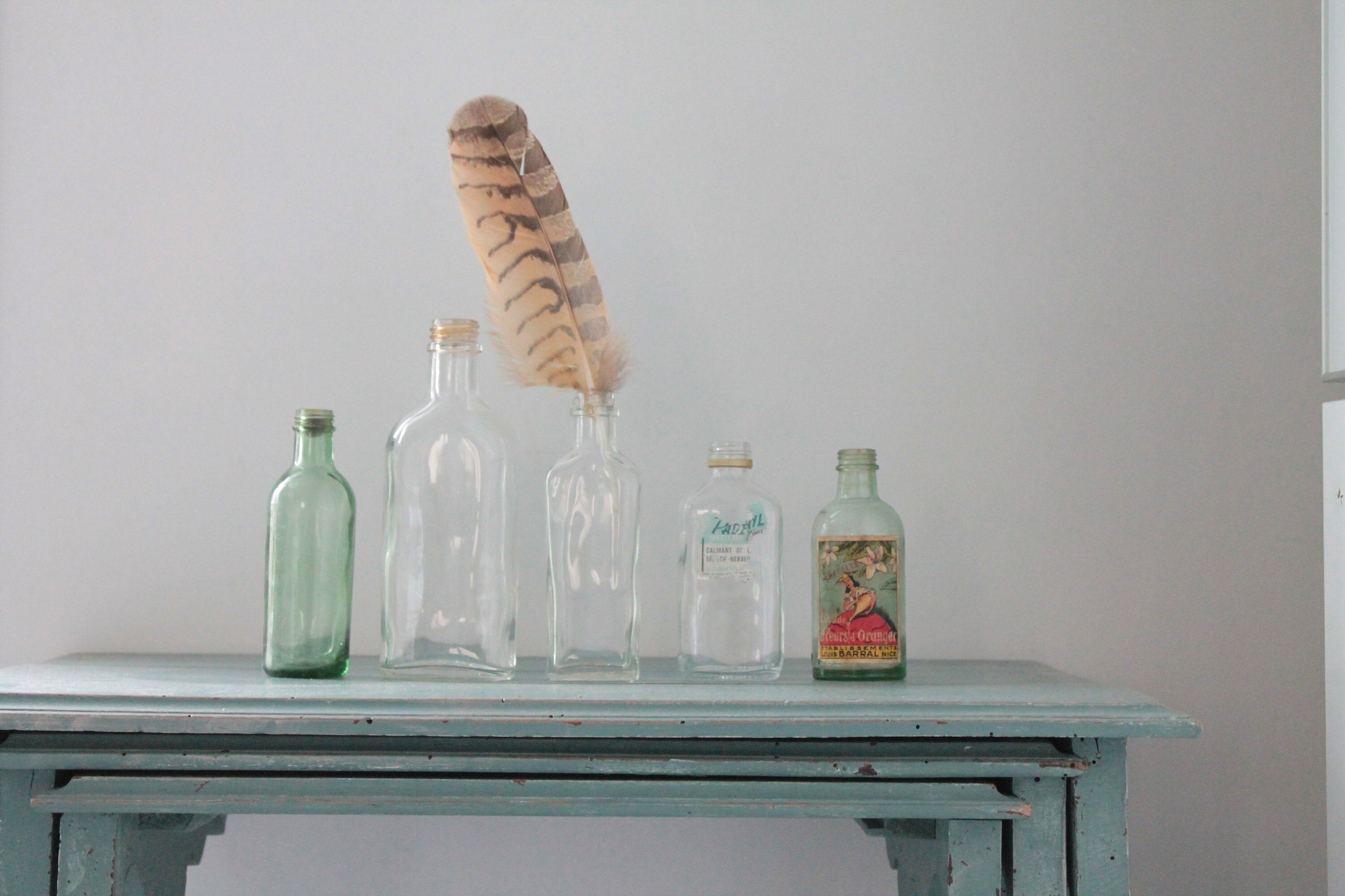 Collection de 7 Bouteilles anciennes en verre