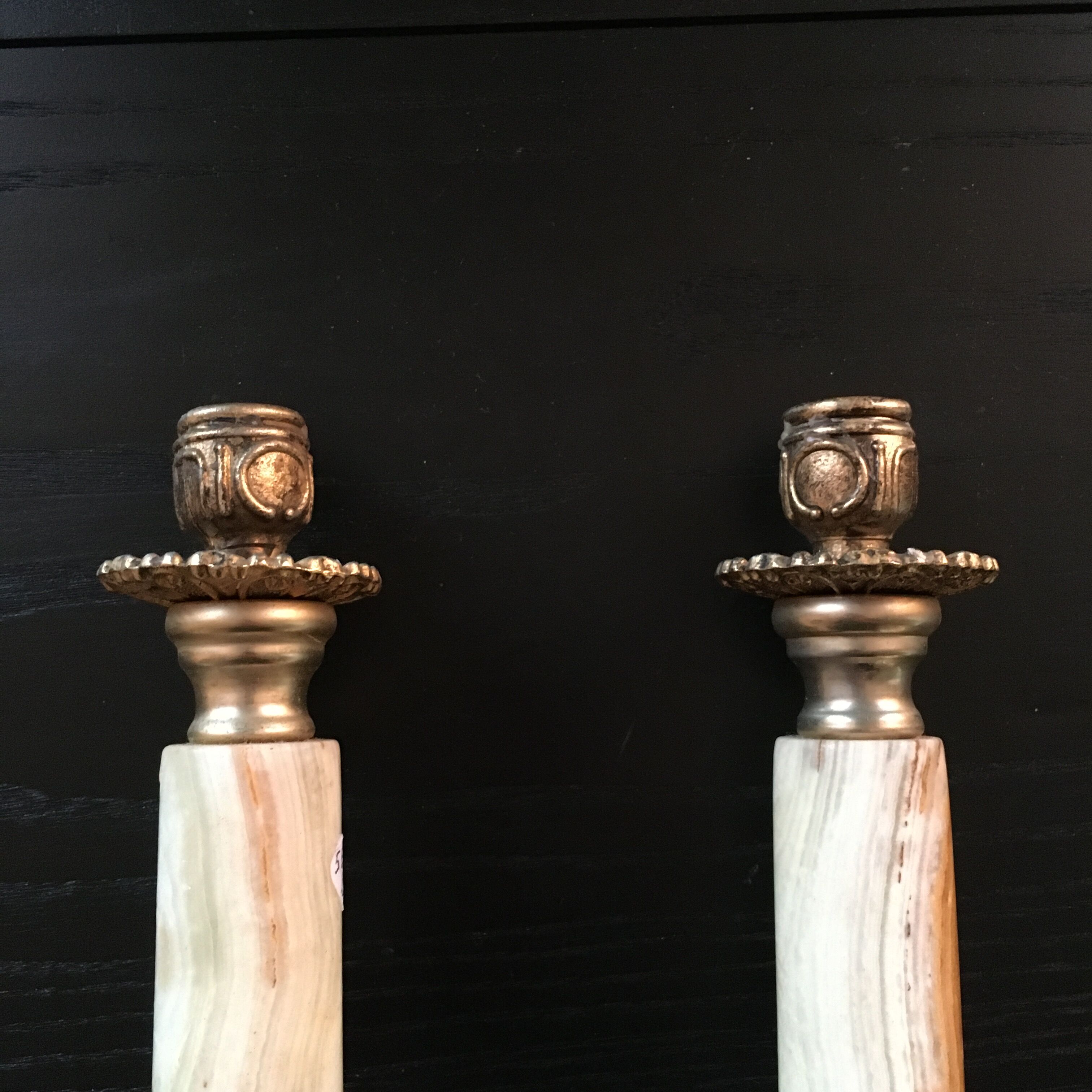 Pair of alabaster and brass candle holders