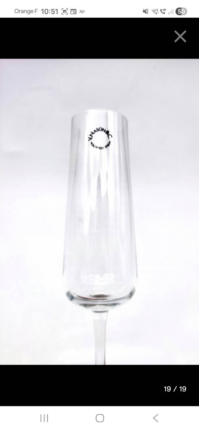 Carafe and 6 stemmed glasses made of Murano glass.