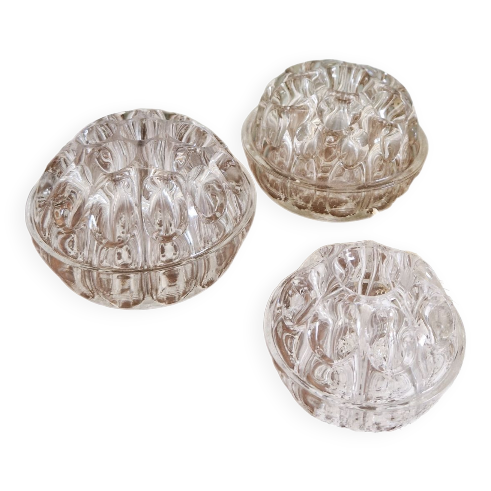 Set of three vintage flowers in transparent molded glass