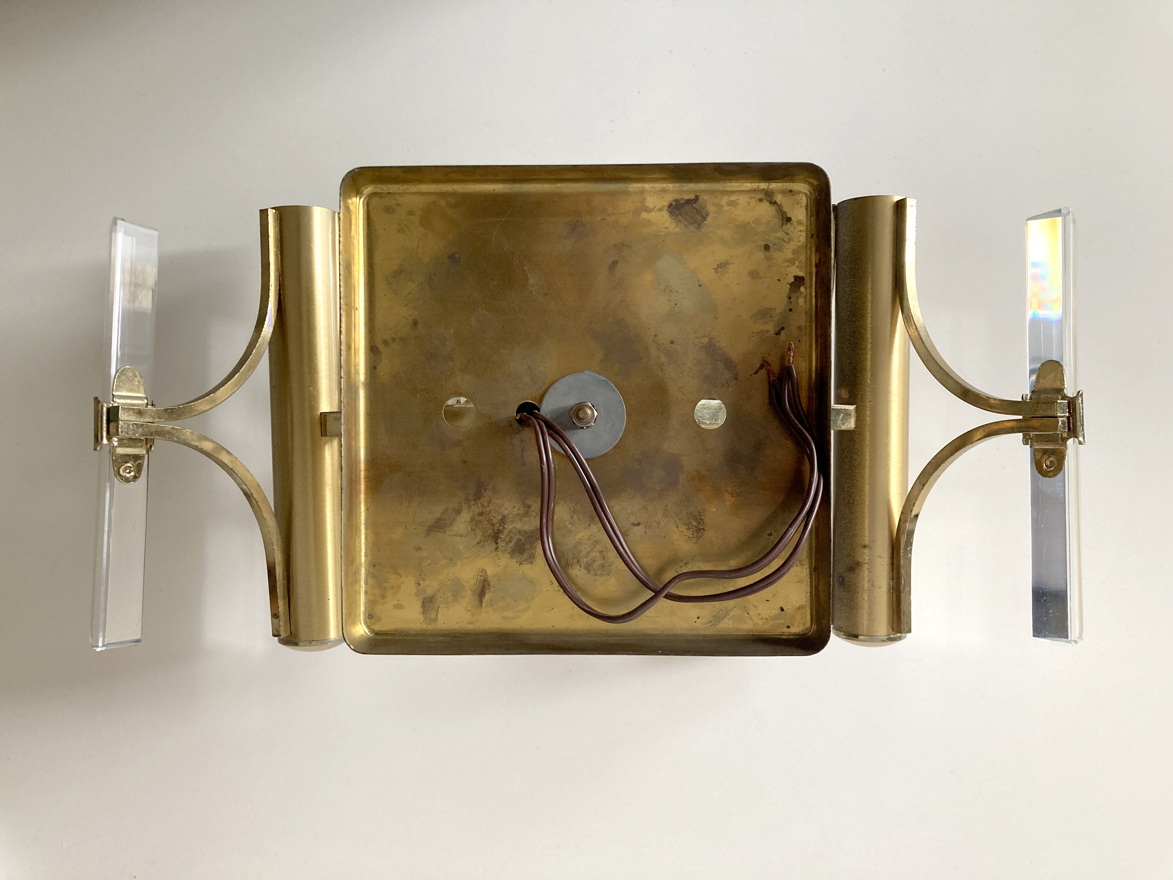 Golden wall lamp and glass crystals. 1970