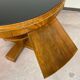 Art Deco game table with a black glass top.