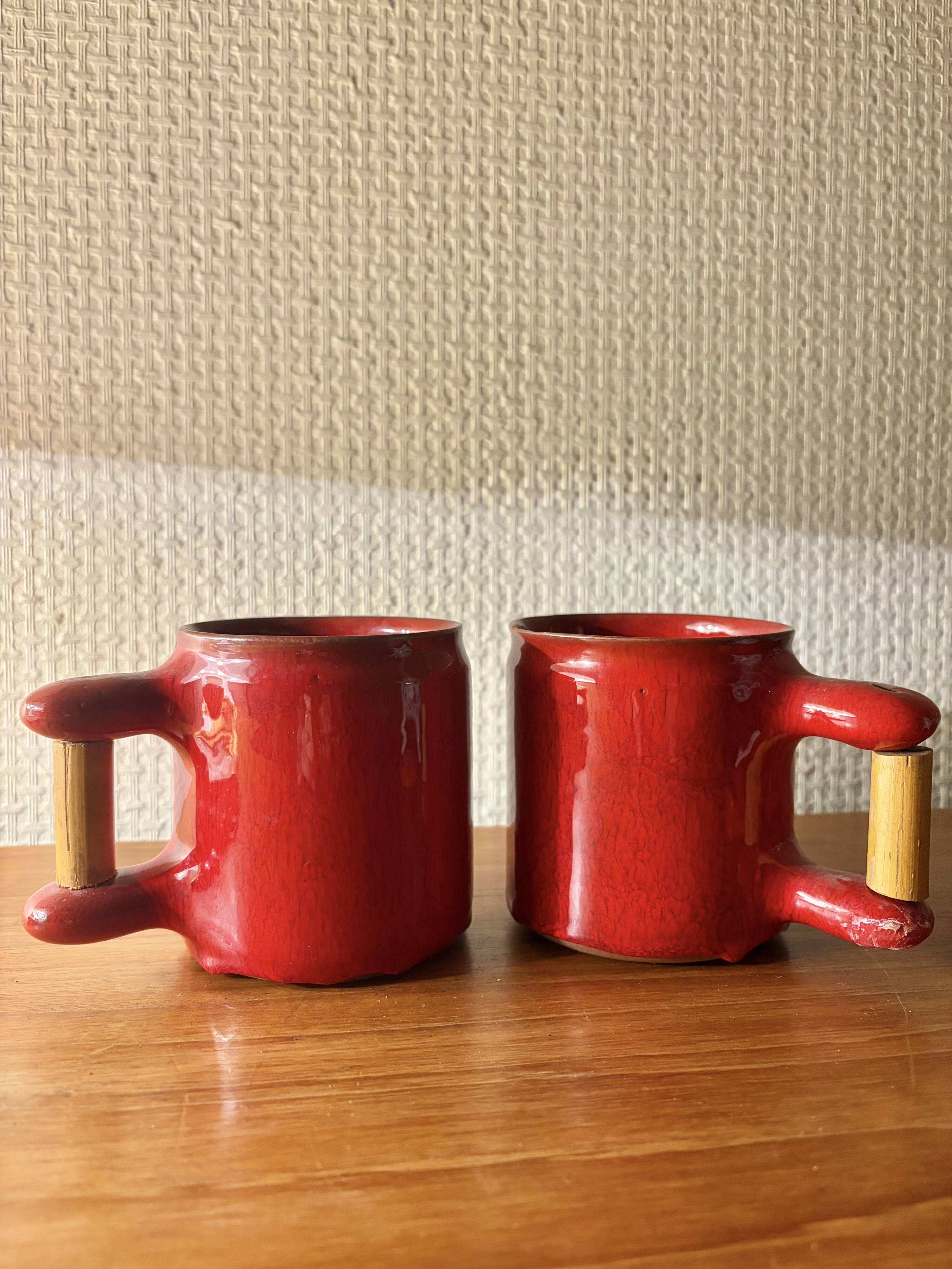 Cloutier Brothers red mugs