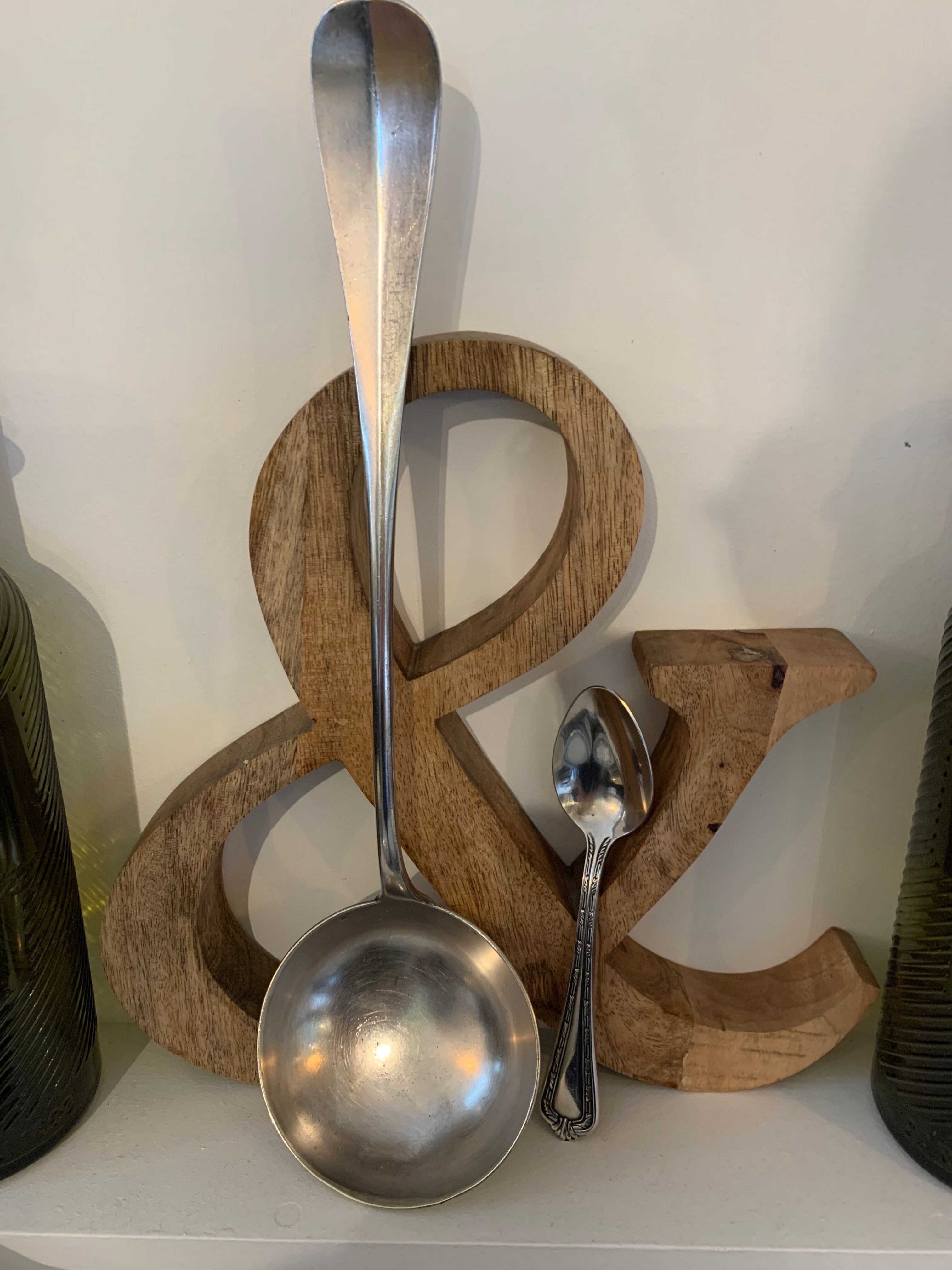 1 ladle and 1 spoon in silver