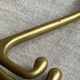 Adjustable nautical coat hook in solid brass