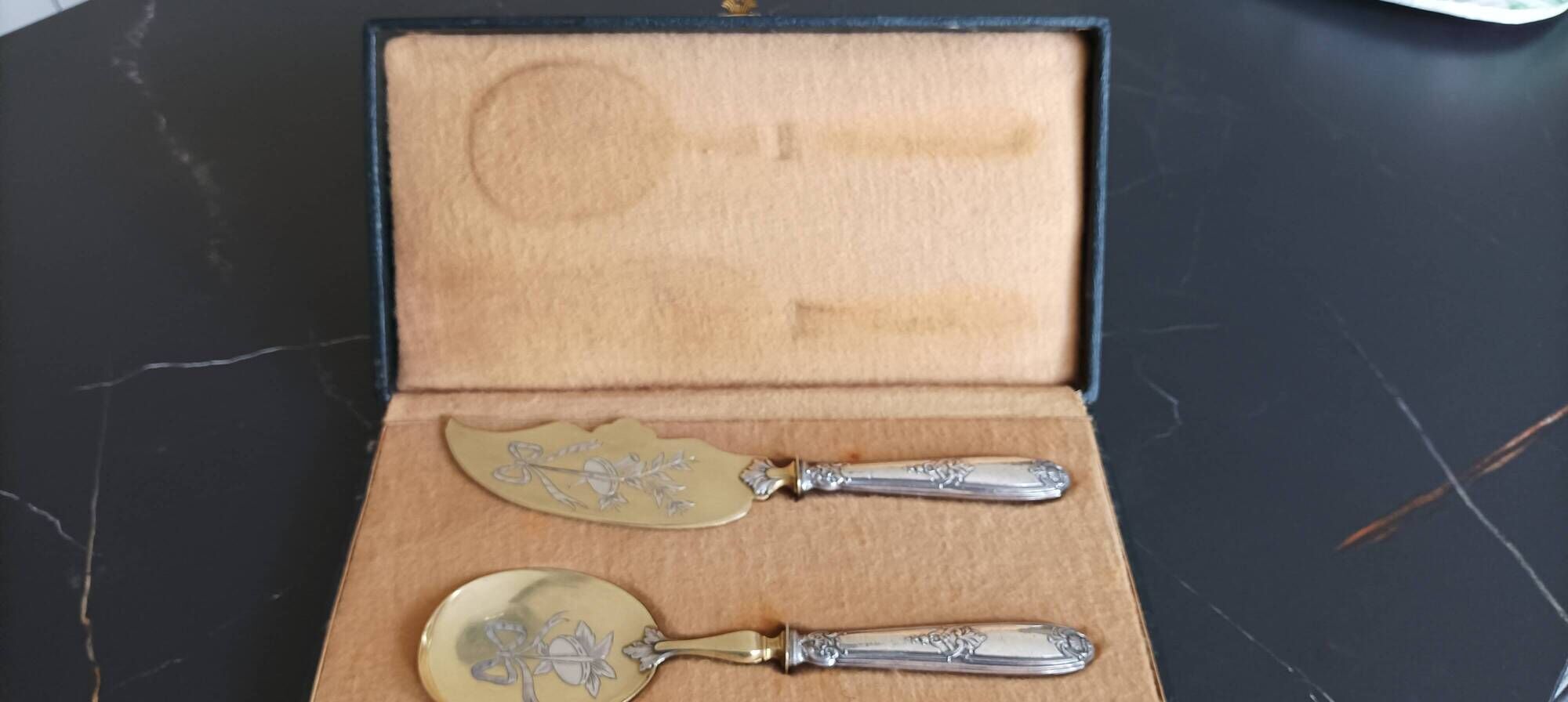 Ice cutlery with silver-plated handles