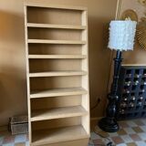 Painted wooden display shelf with an incline