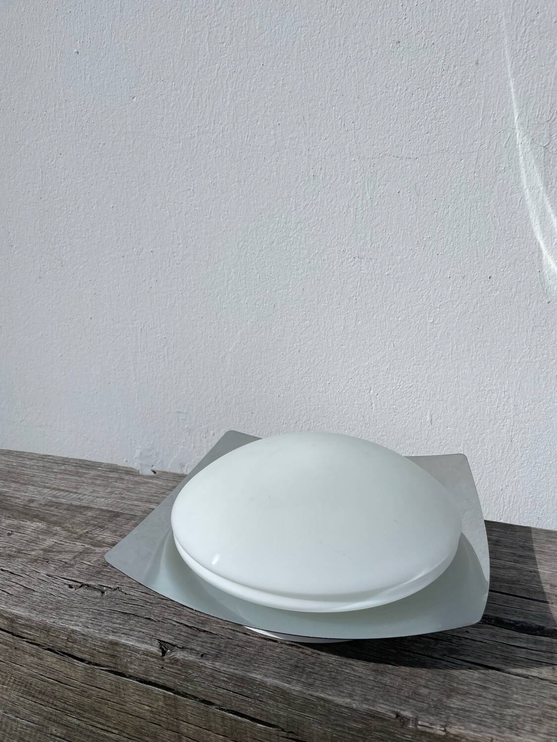 White glass and stainless steel ceiling light