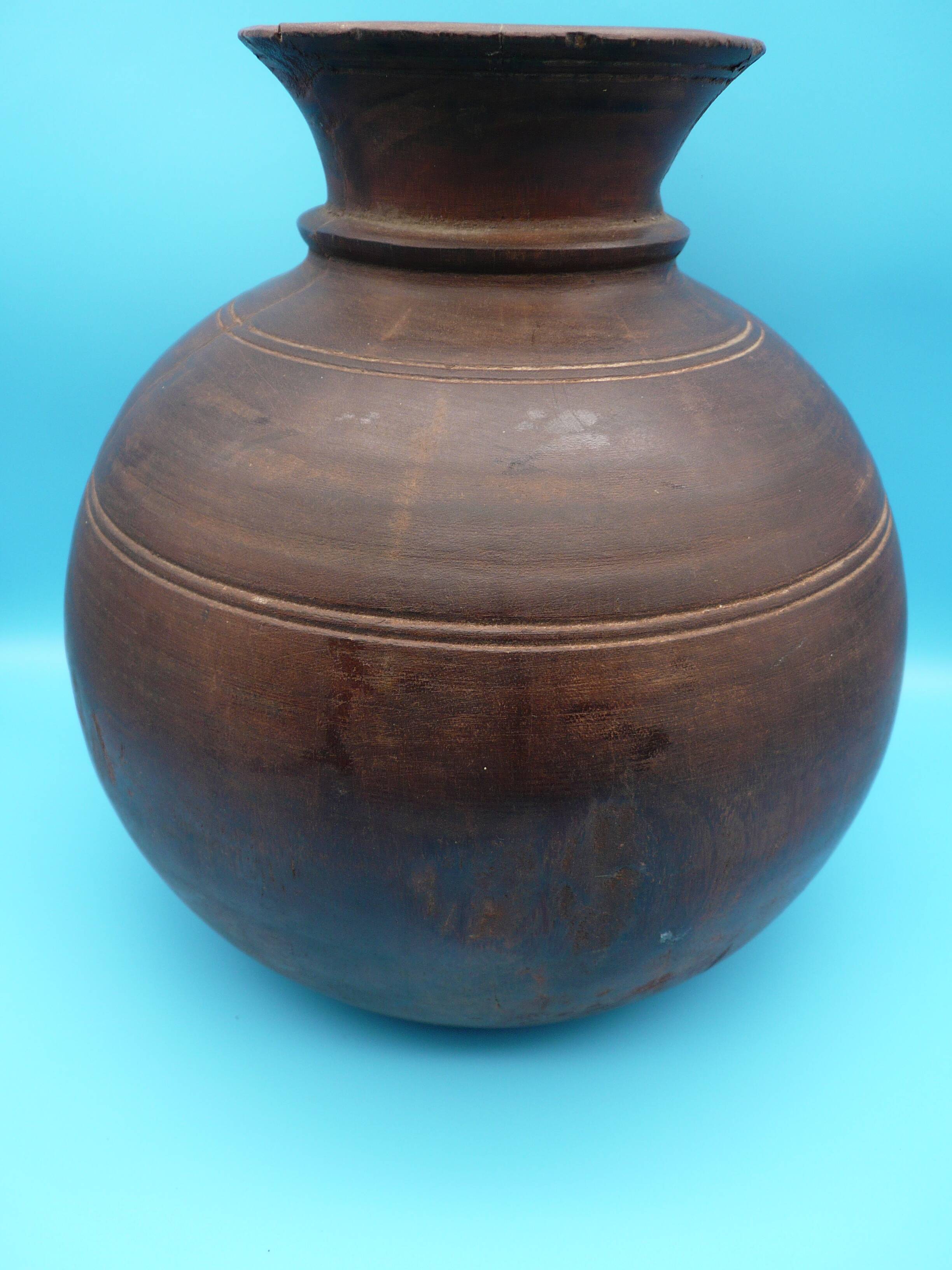 Large carved wooden pot / India