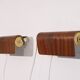 Pair of Scandinavian wall lamps in wood and brass 1960