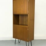 Narrow teak bookcase with two doors by Omann Jun, 1970s
