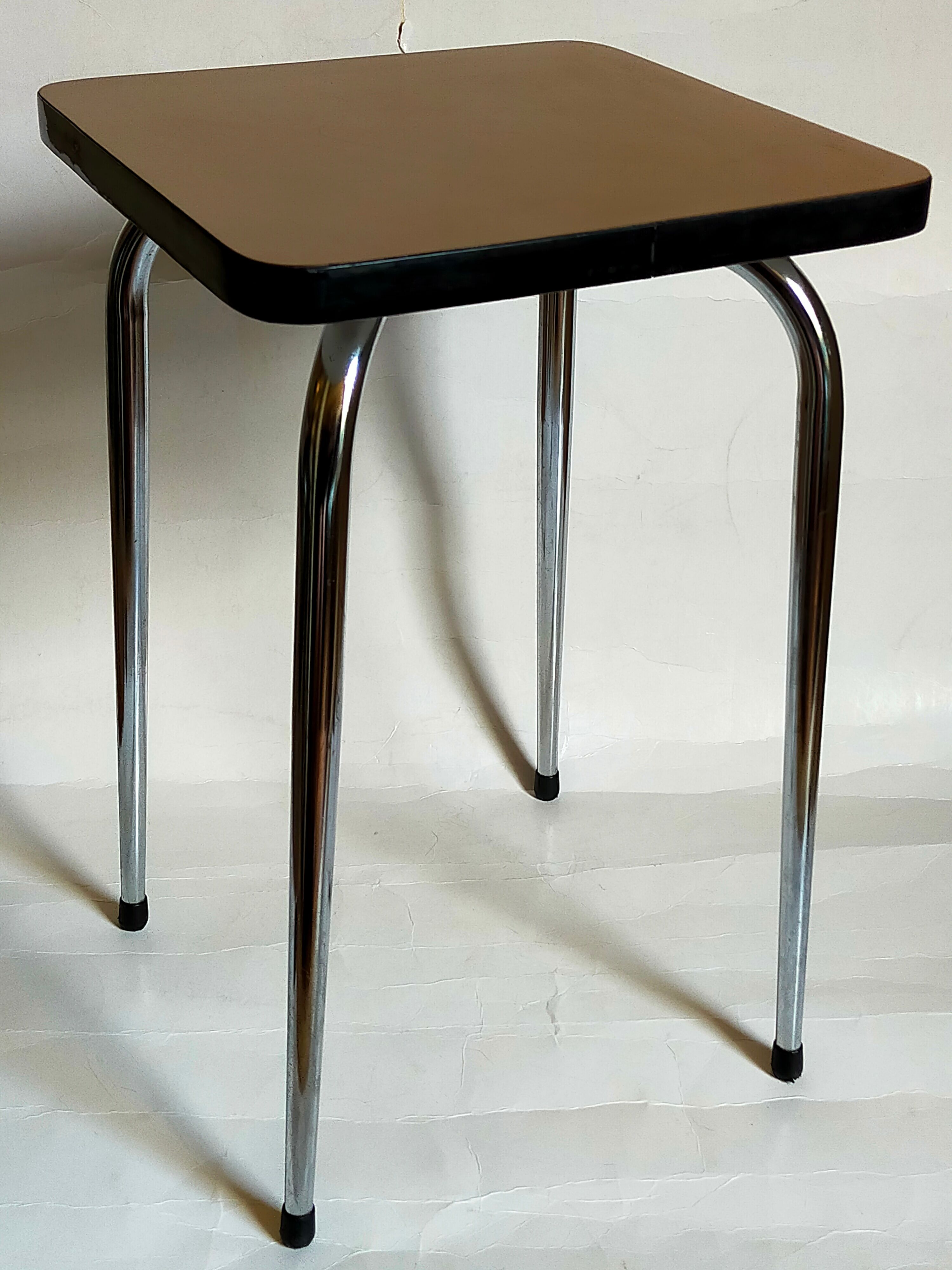 Vintage formica stool with tapered feet