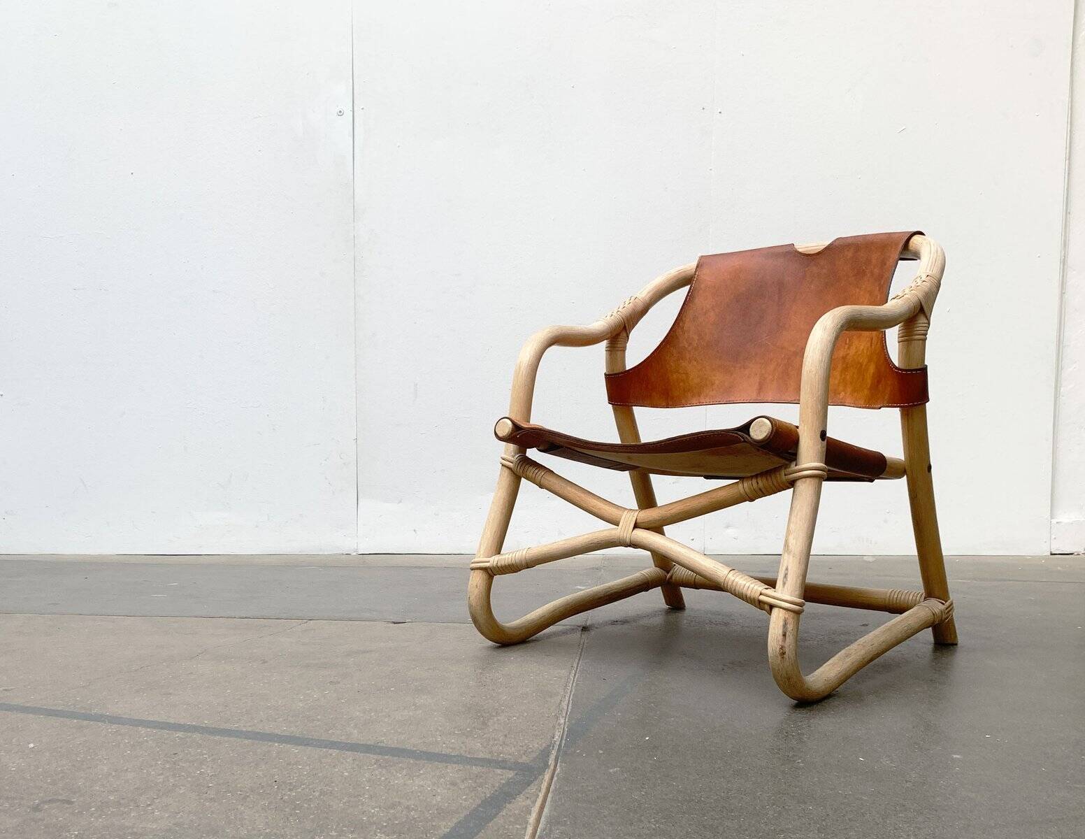 Mid-century safari lounge chair in bamboo and Danish leather, 1960s.