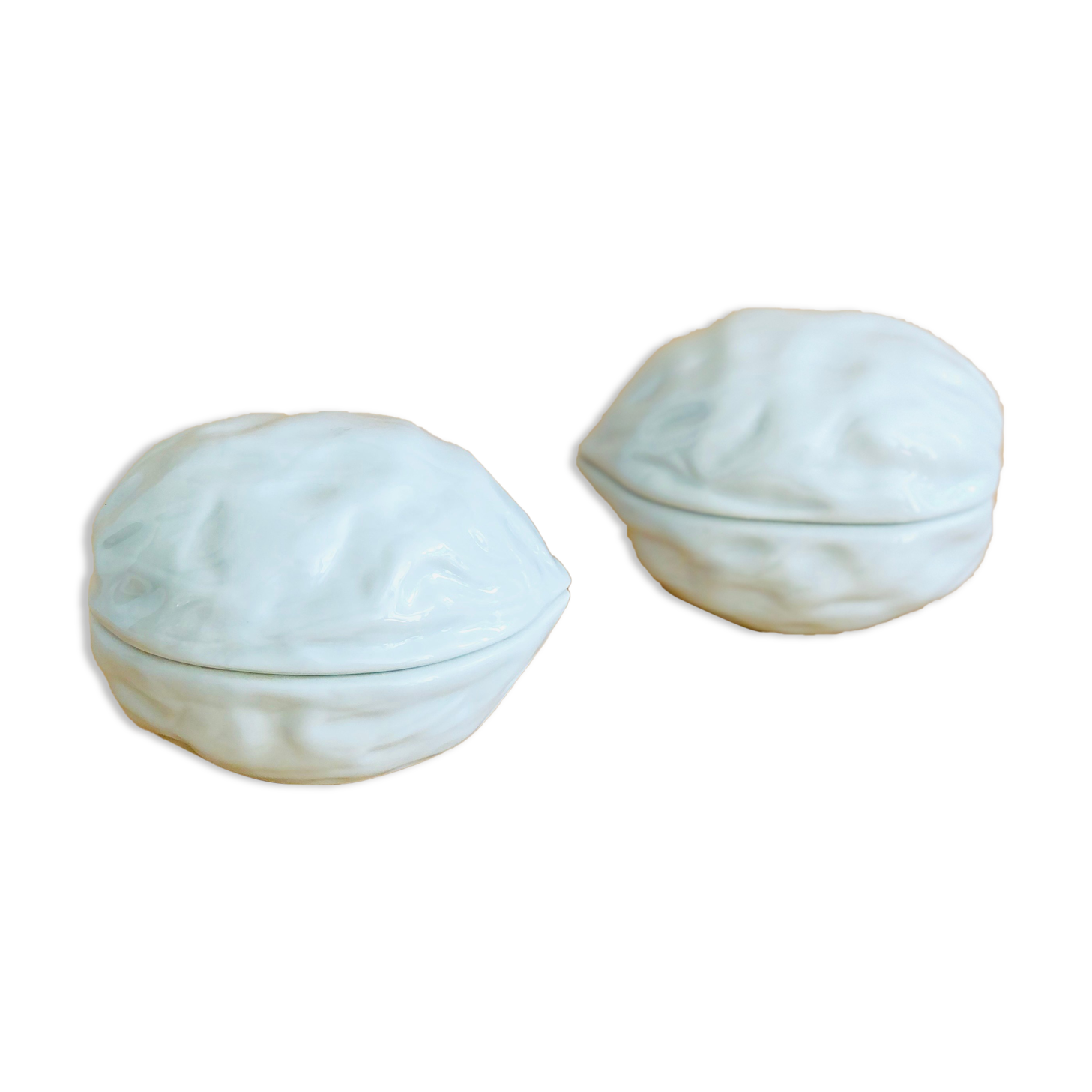 Pair of Limoges porcelain nut boxes