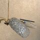 Brass and moulded glass chandelier, Bakelite arrow, 1950s, 5 lamps.