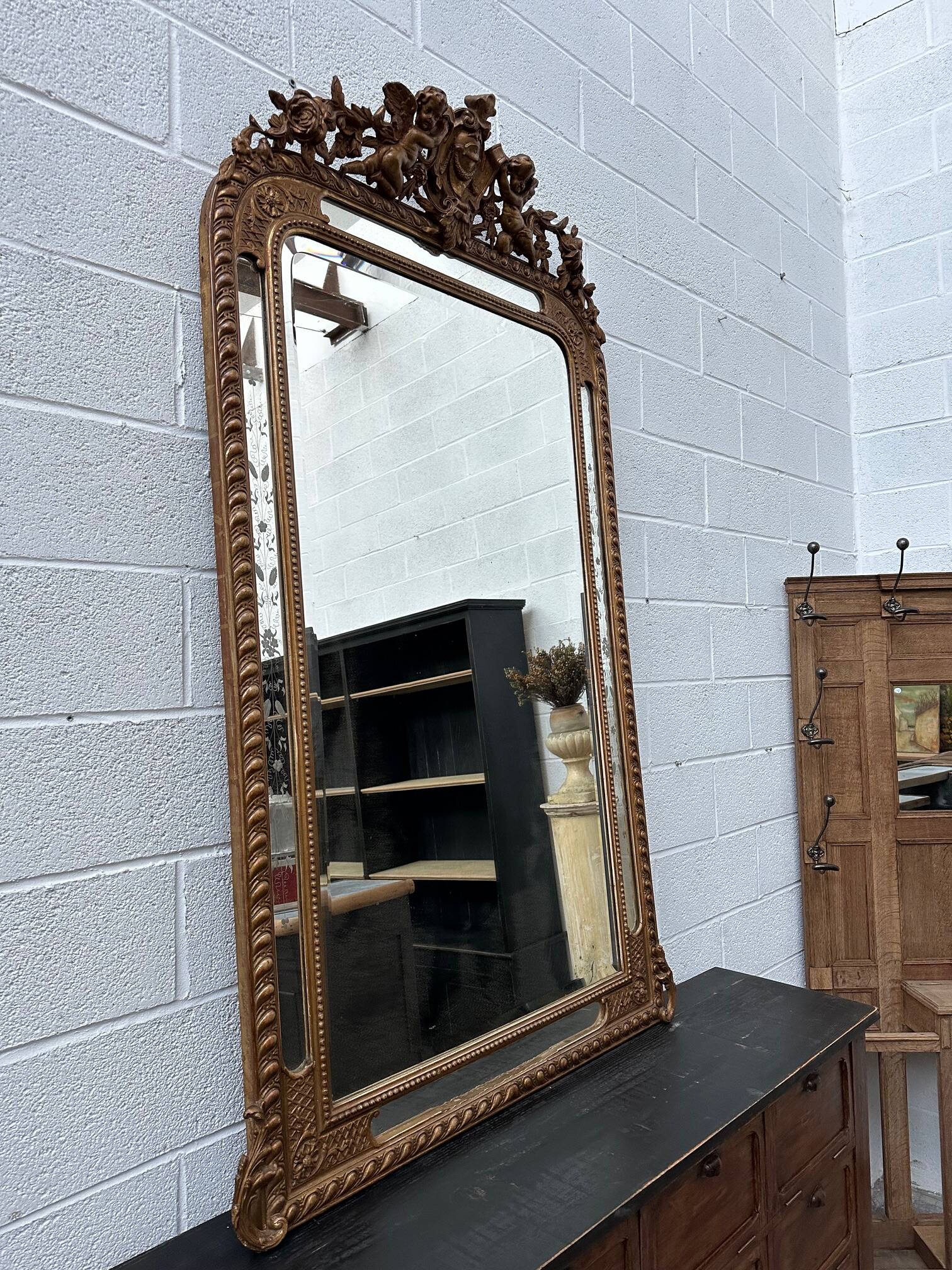 19th century mirror with cherubs