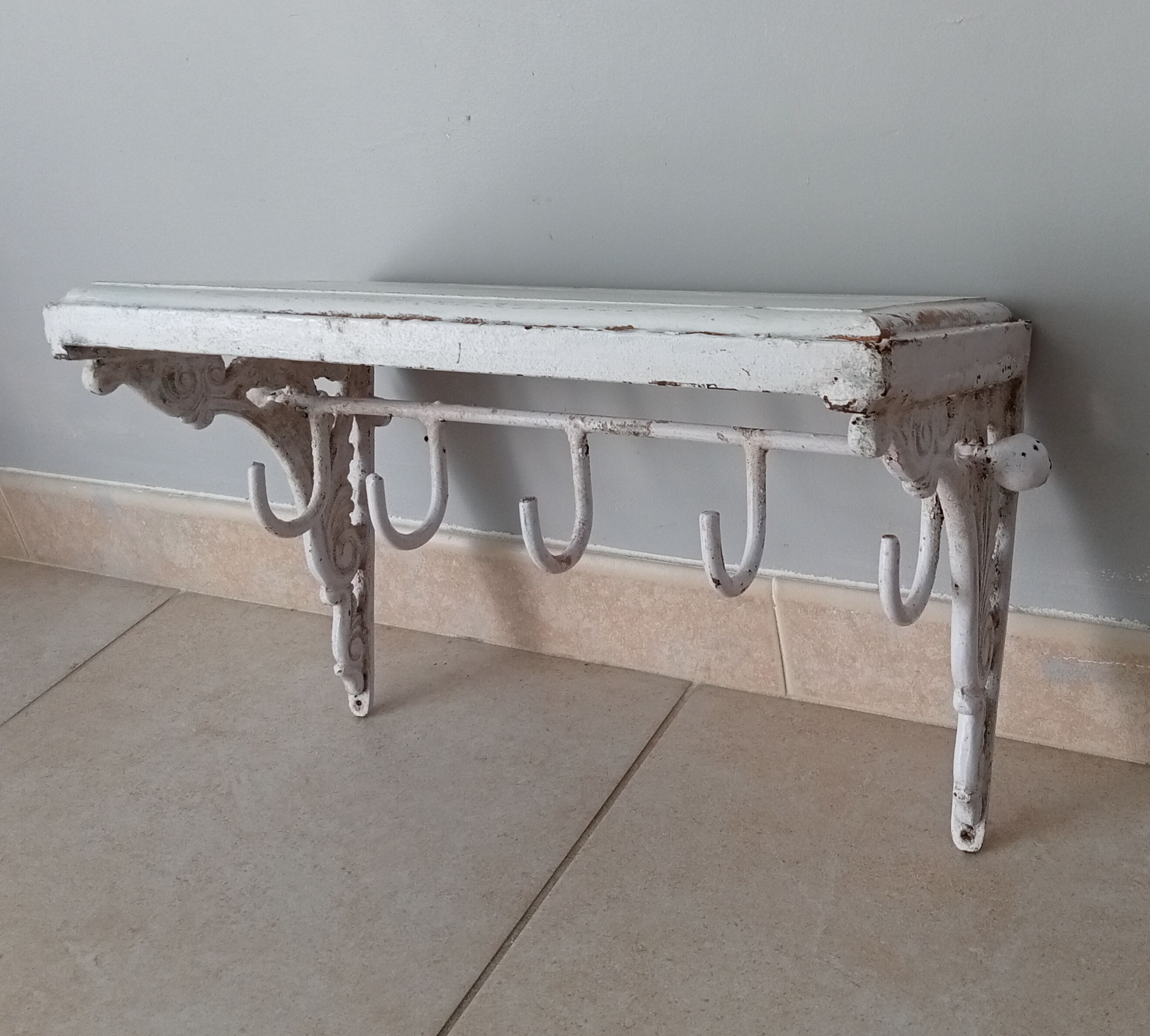 Old coat rack in cast iron and wood, 20s/30s