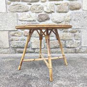 Table basse ronde vintage rotin et vinyle façon paille tressée