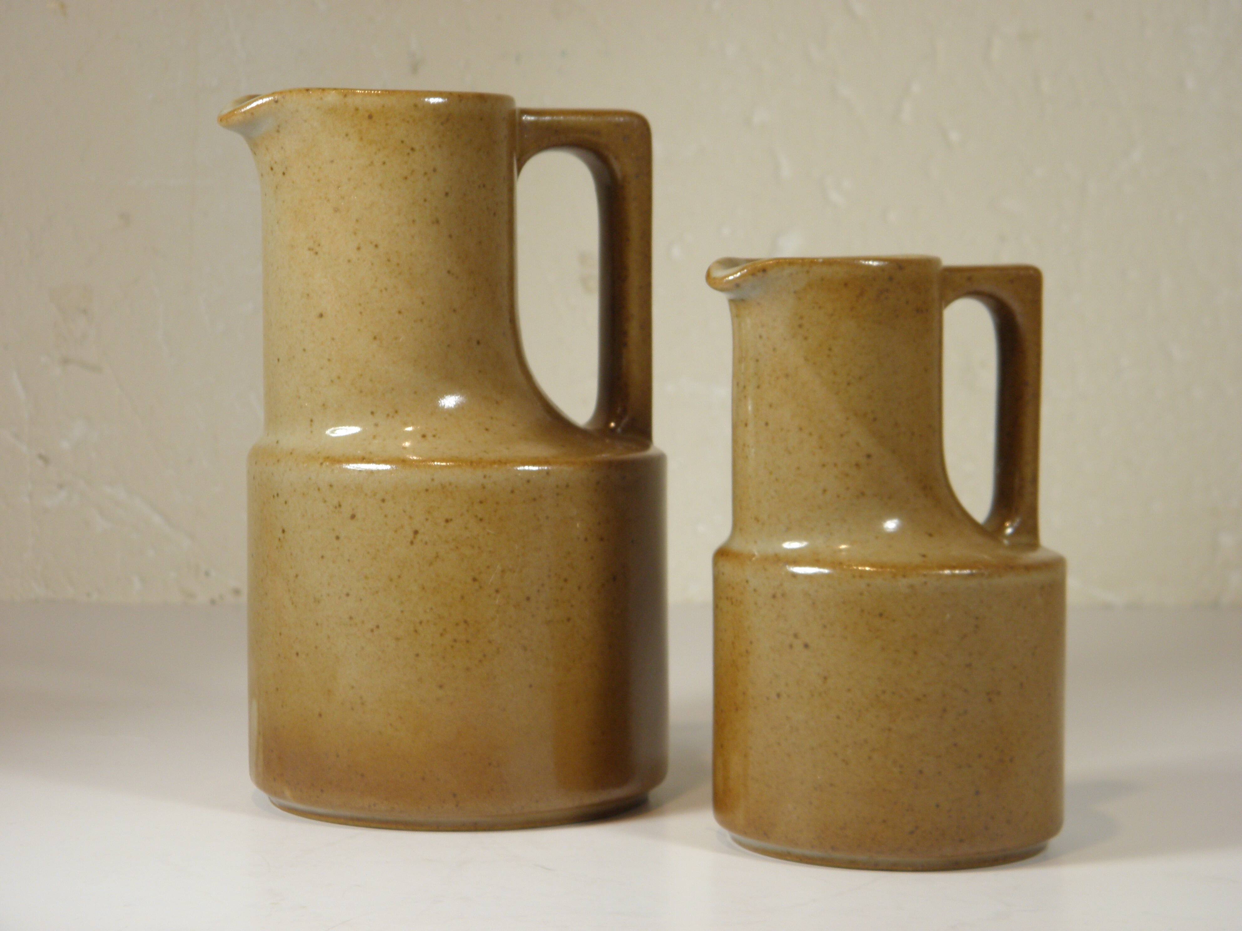 TWO STONEWARE jugs from Brenne