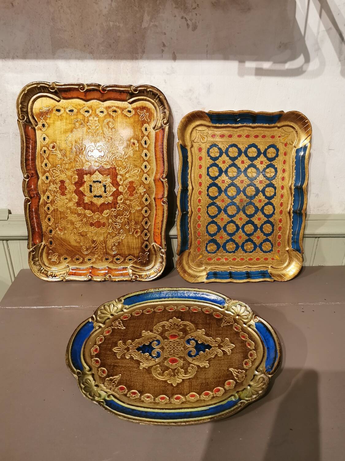 Trio of vintage Florentine trays