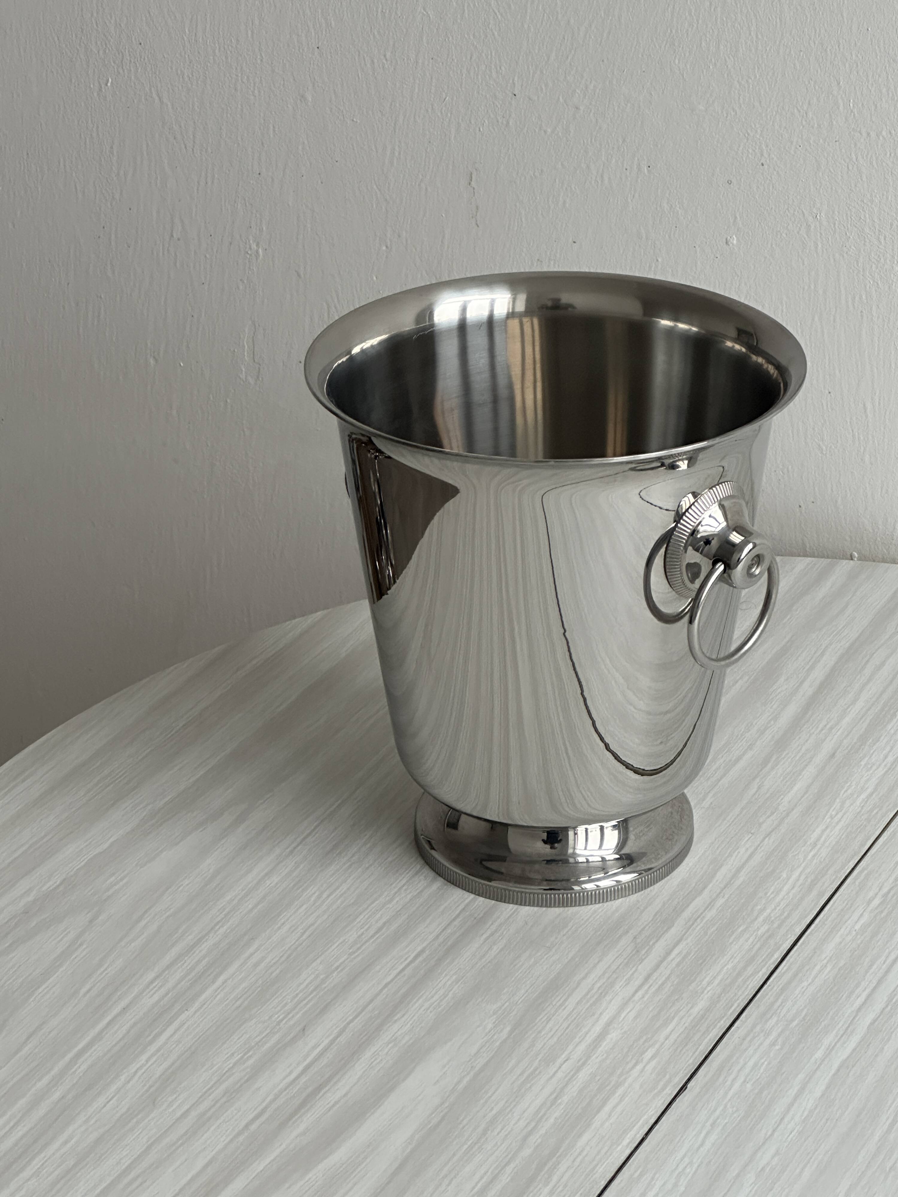 Shiny metal champagne bucket