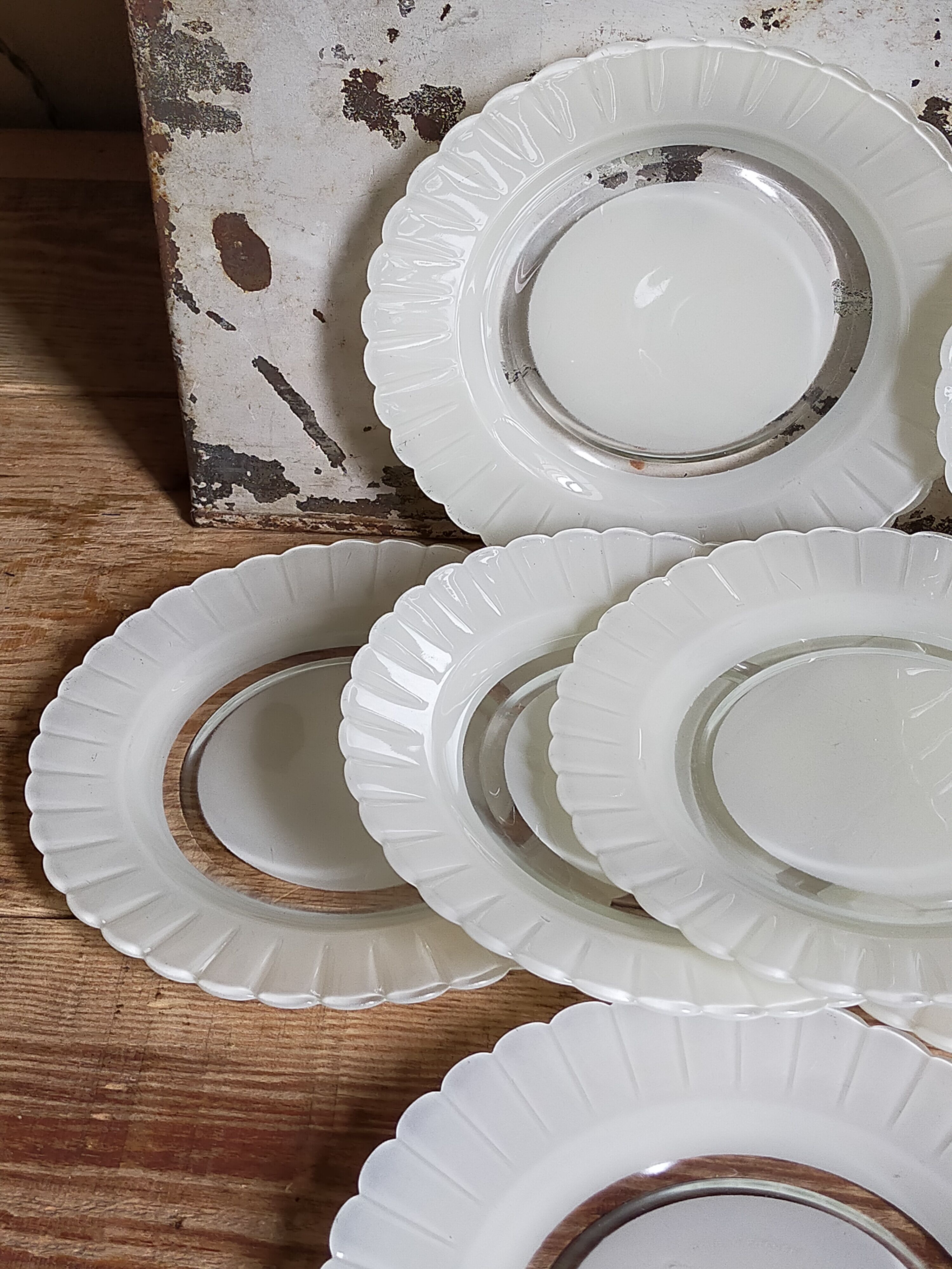 Eight Duralex dessert plates in 60s painted glass