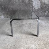 Coffee table with chrome legs and glass top, 1970