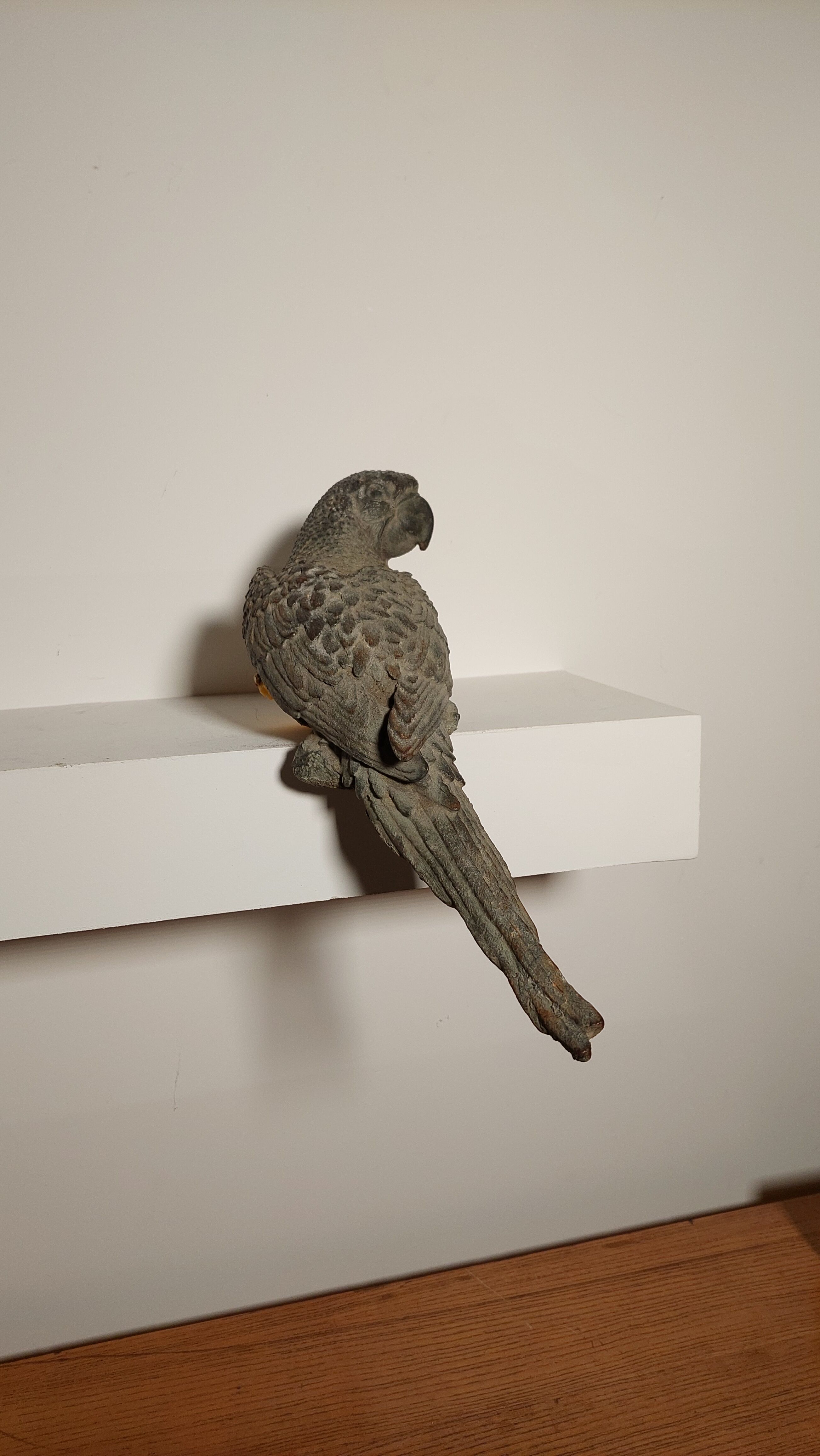 Decorative cast iron parrot
