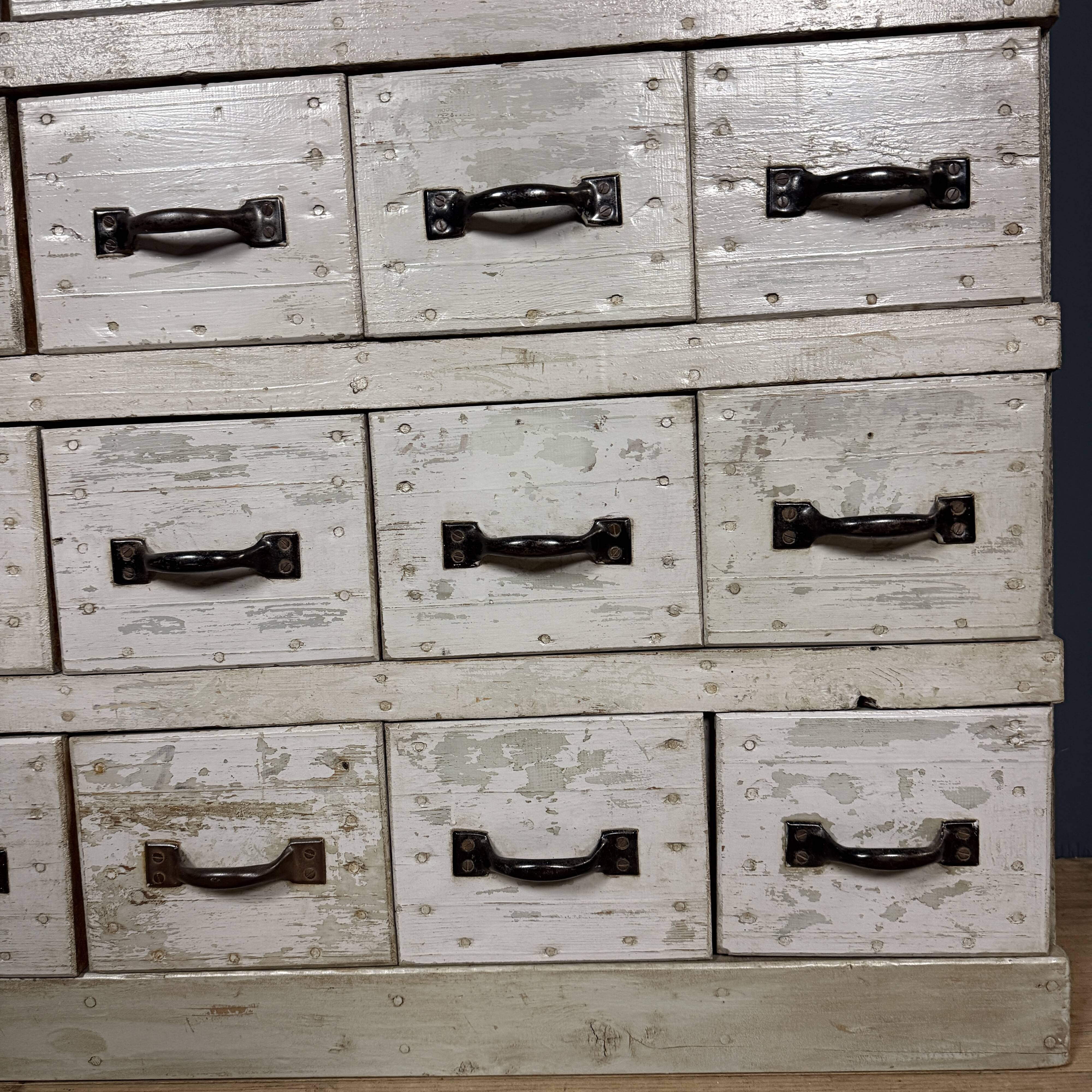 Old light grey workshop drawer cabinet with 25 drawers