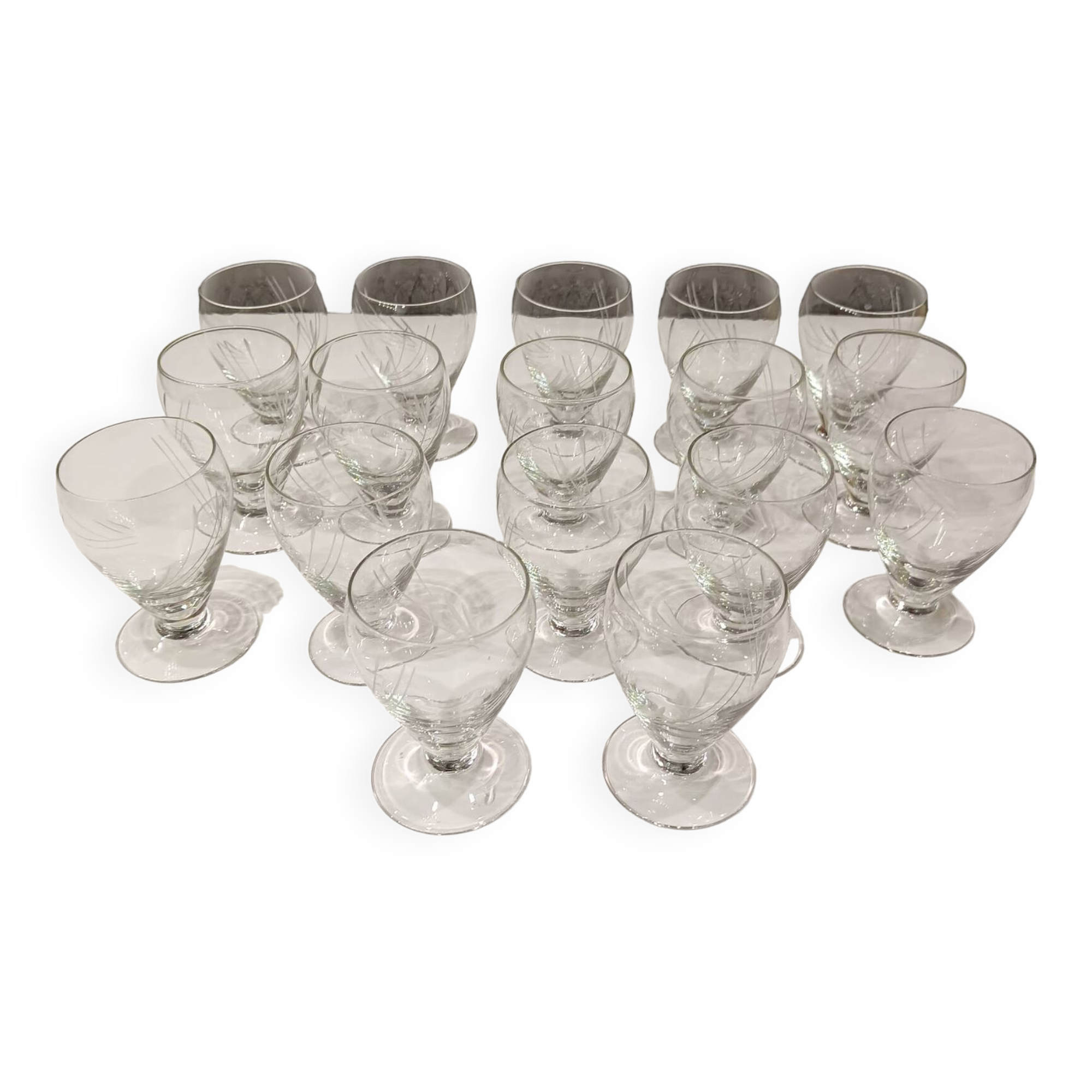 17 small crystal liquor glasses, chiseled pattern - Perfect condition.