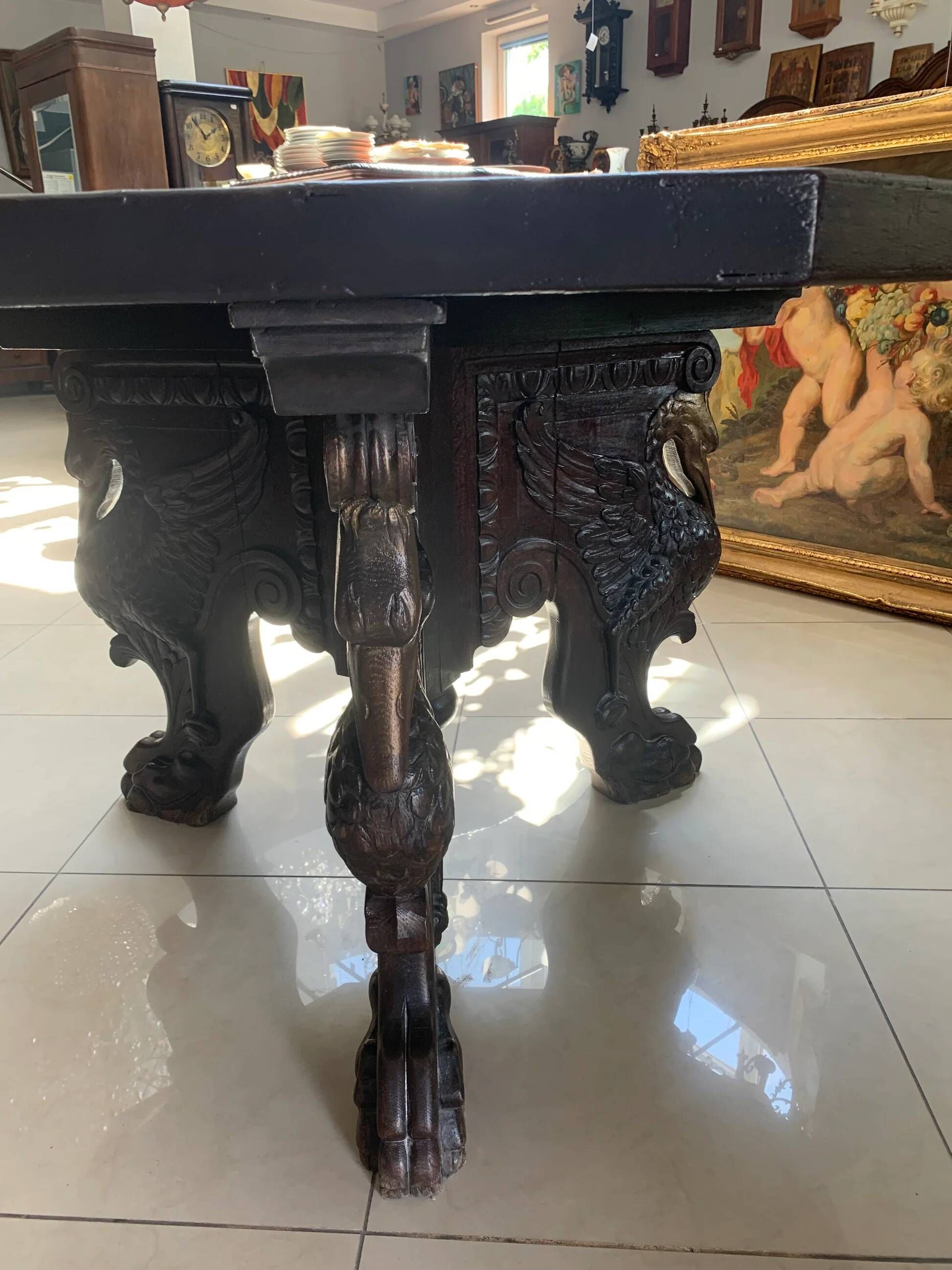 Octagonal oak table, 19th century, with griffins.