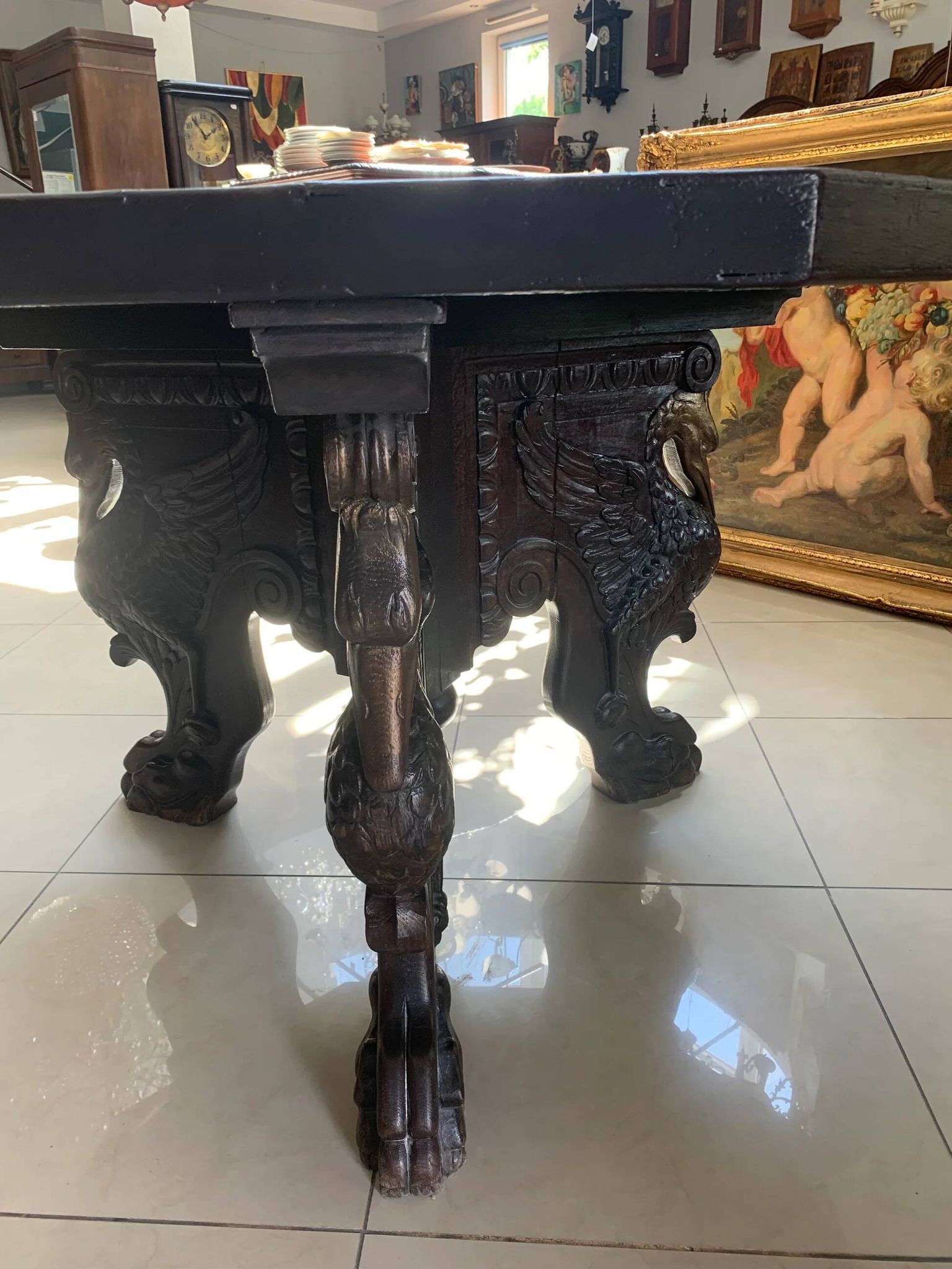 Octagonal oak table, 19th century, griffins