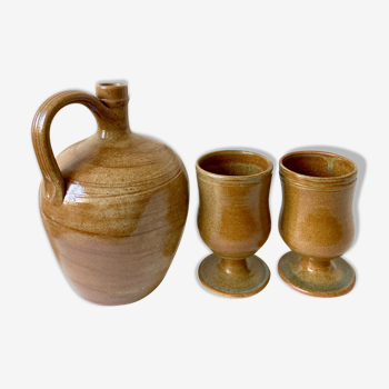 Stoneware service pitcher and cups