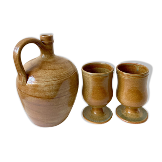 Stoneware service pitcher and cups