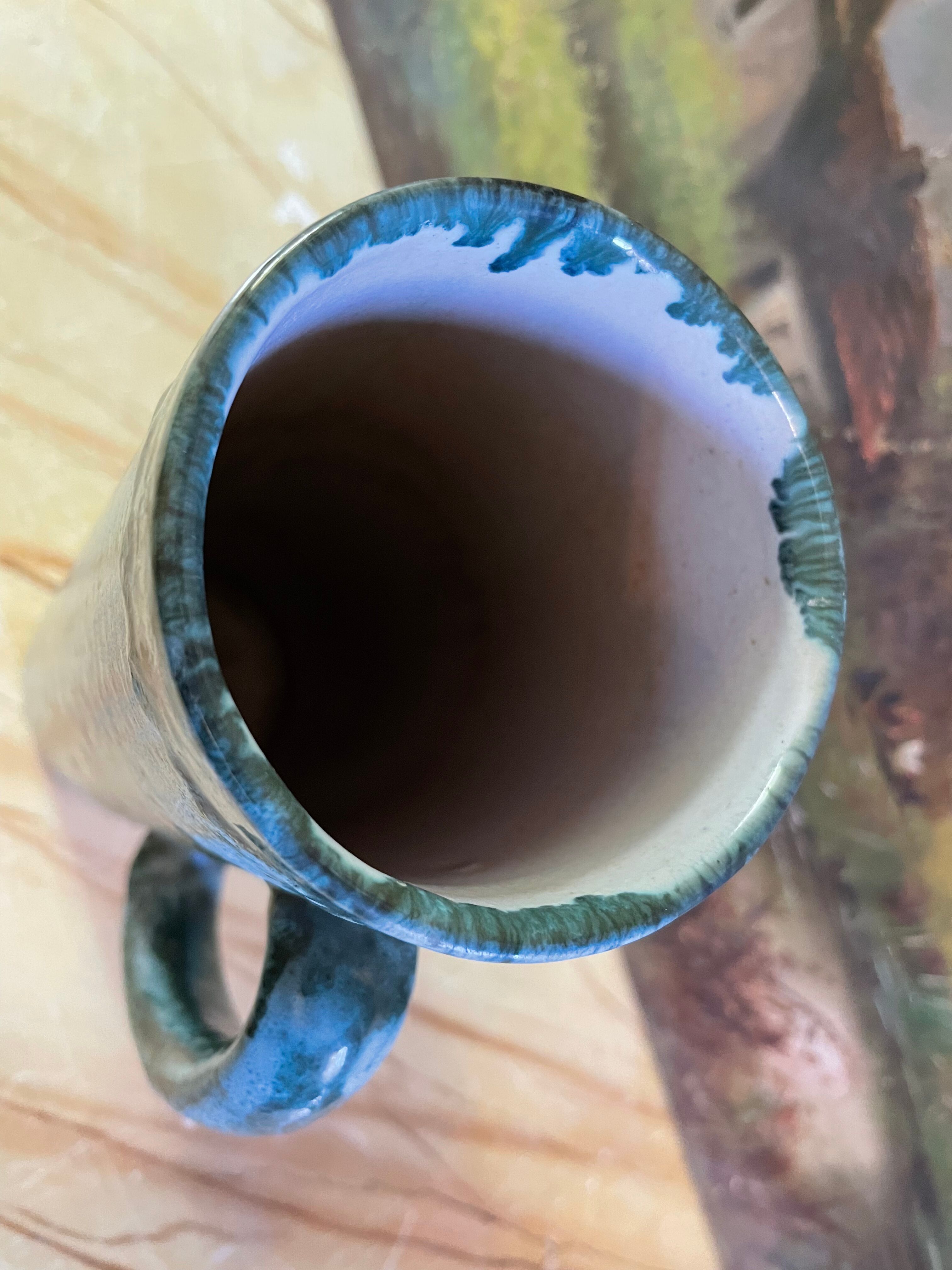 Blue ceramic pitcher