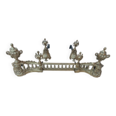 4 andirons and a fireplace bar in gilded bronze in the Louis XVI style.