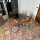 Table vintage modulable. 1970. Inox et verre. Italie.