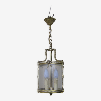 Vintage bronze lantern. with ribbon decoration