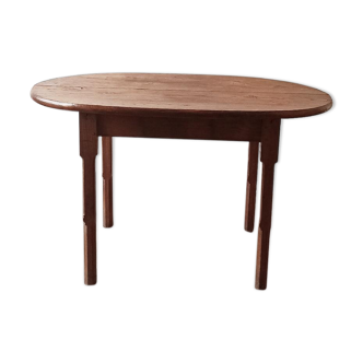 vintage oval dining table made of solid wood