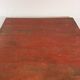 Table basse en bois laqué rouge