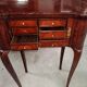 Lady's Commode in Marquetry, Louis XV style, work of the 20th century.
