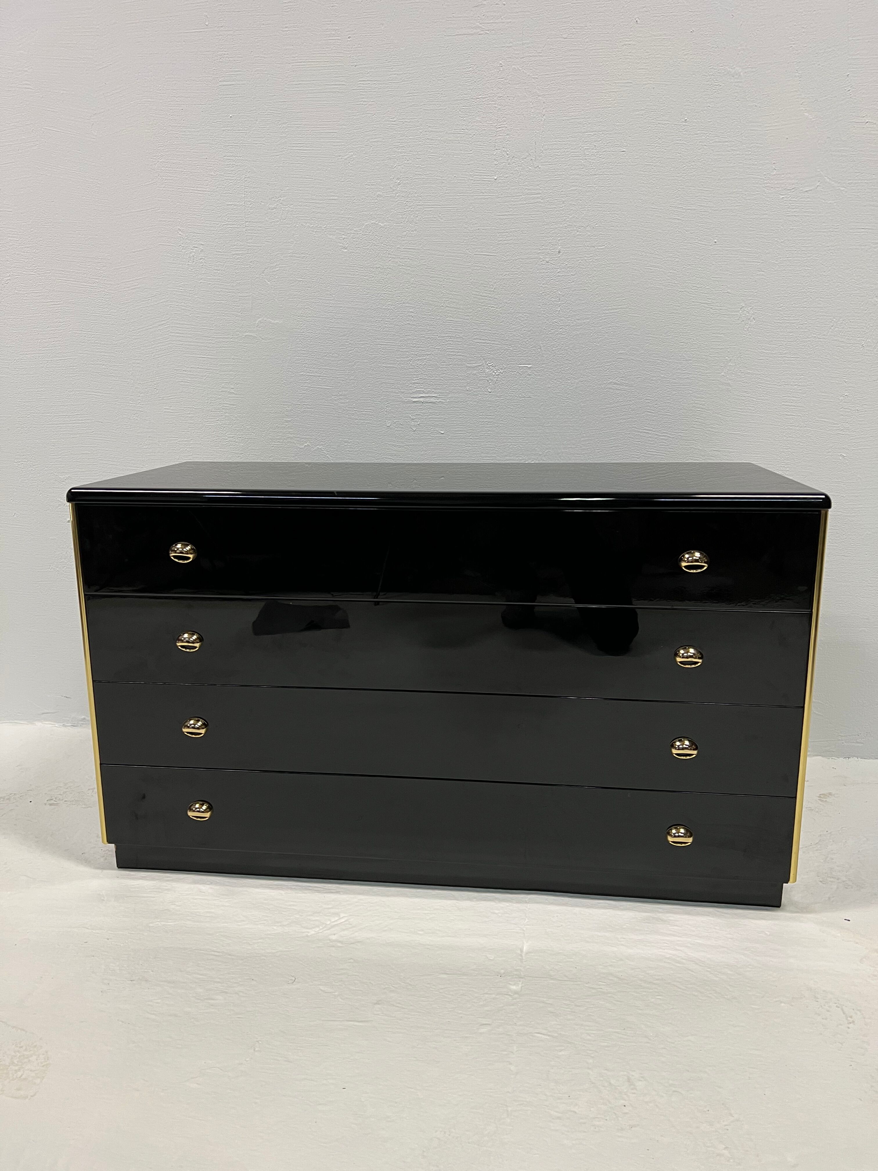 Black lacquered chest of drawers