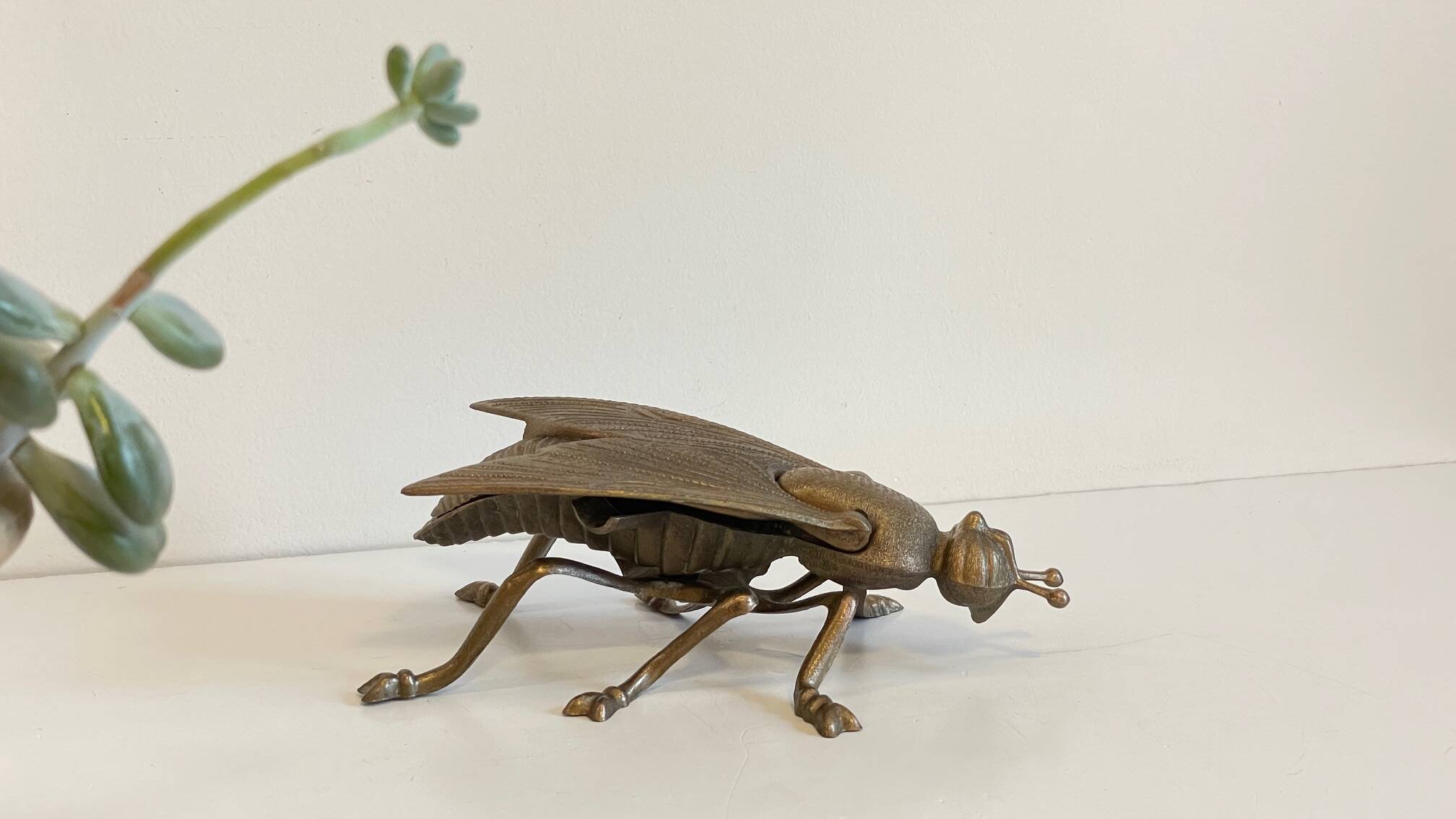 Vintage fly ashtray in patinated metal