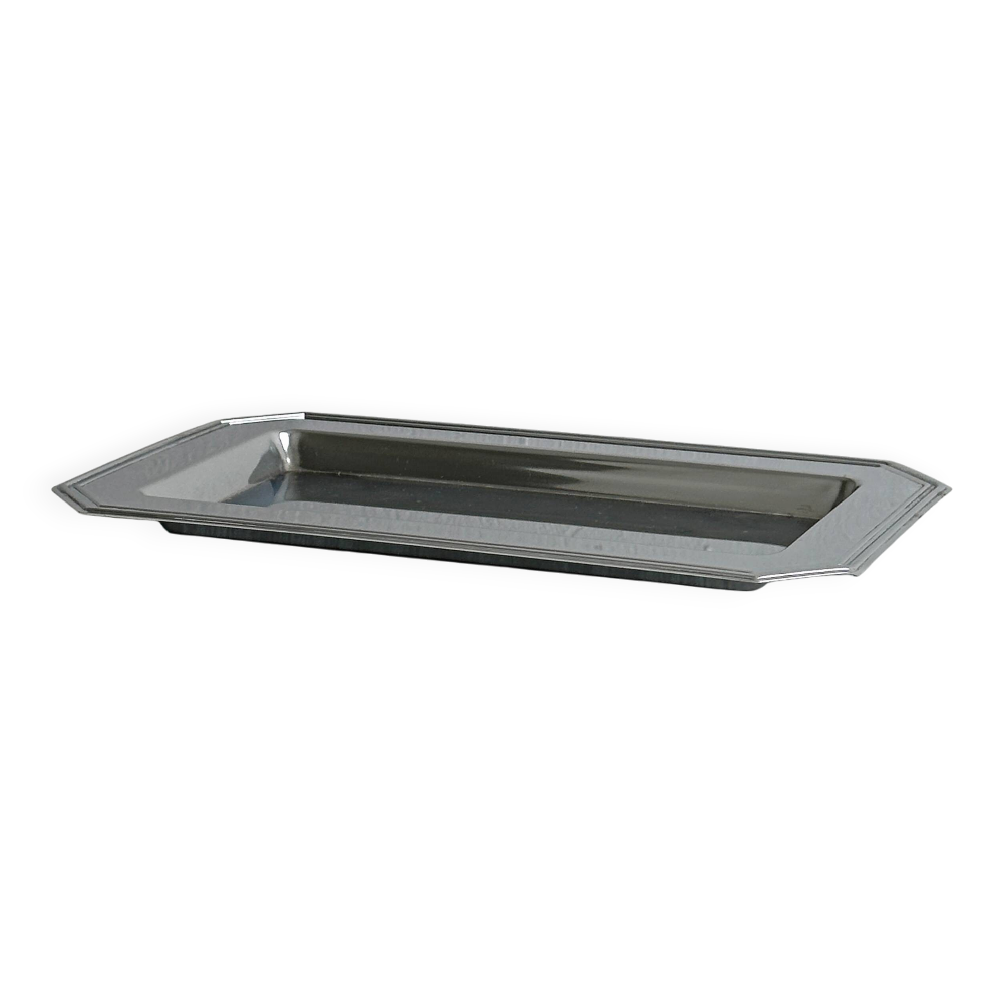 Small rectangular tray made of lightweight metal.