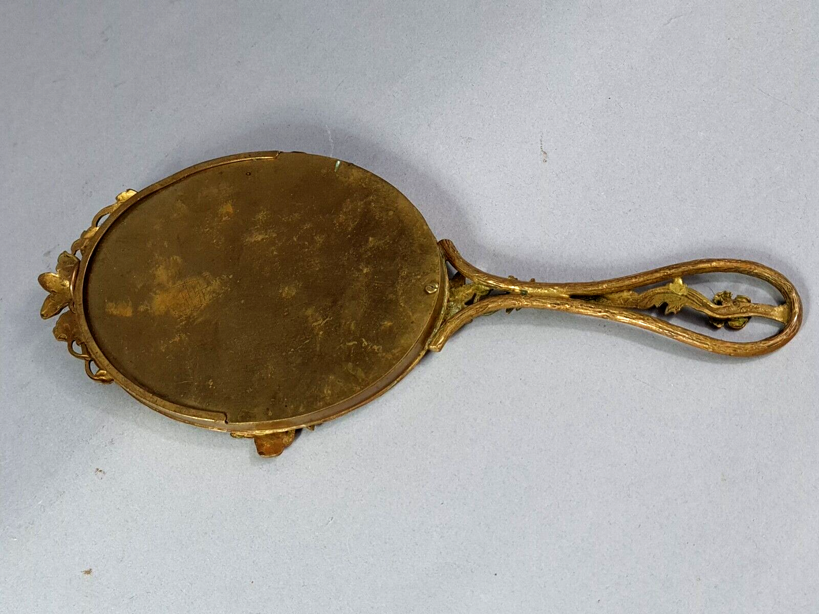 Miroir biseauté face à main ou à suspendre bronze vers 1900 SB152