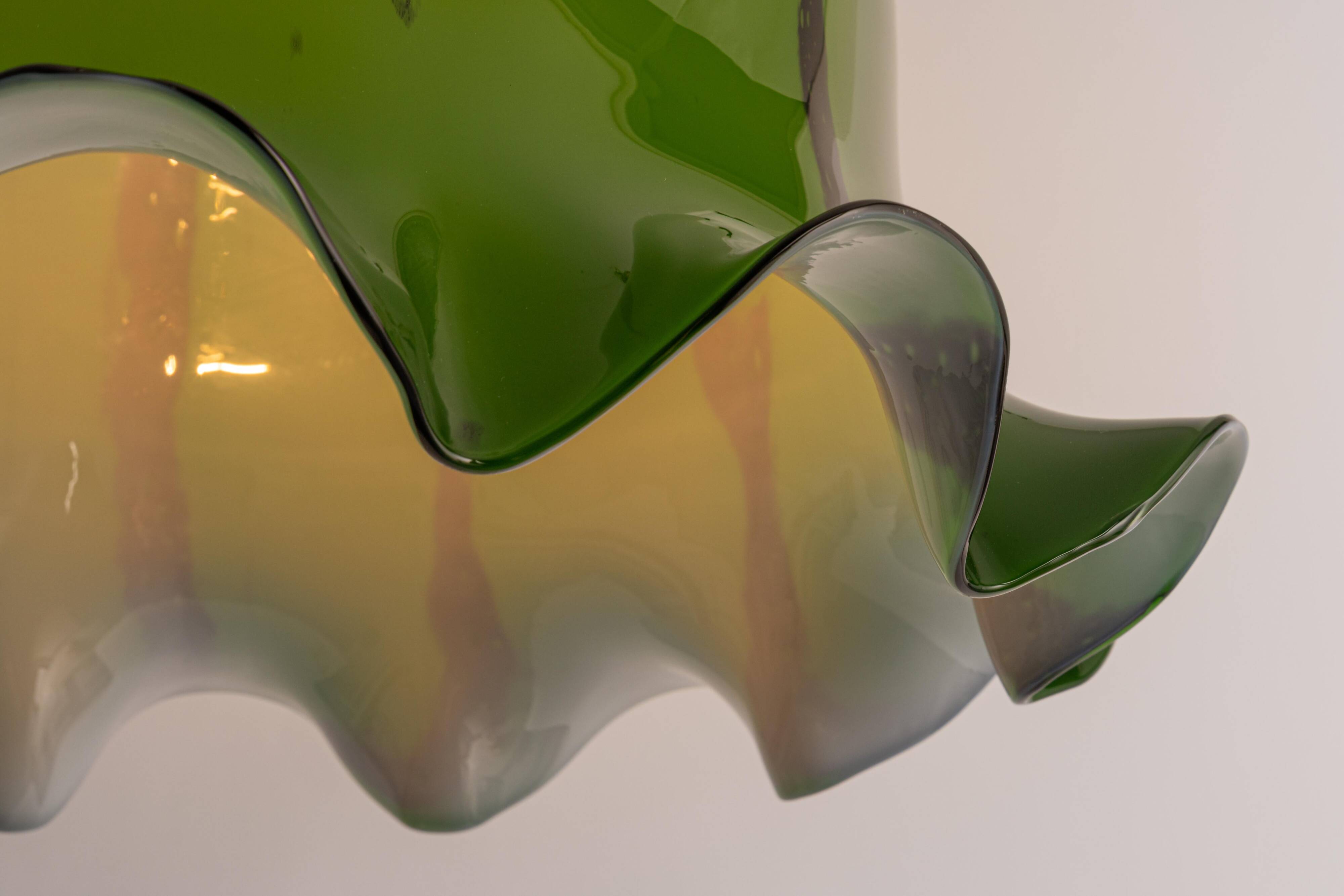 Orange glass pendant by Peill Putzler, Germany, 1970.