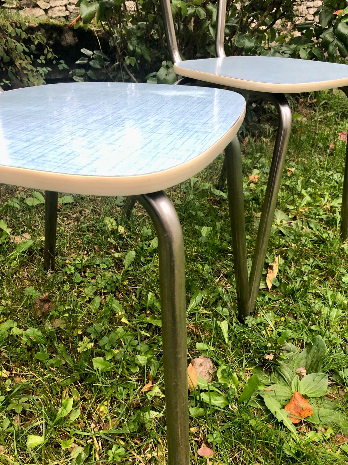 2 blue formica chairs