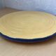 Yellow ceramic trivet